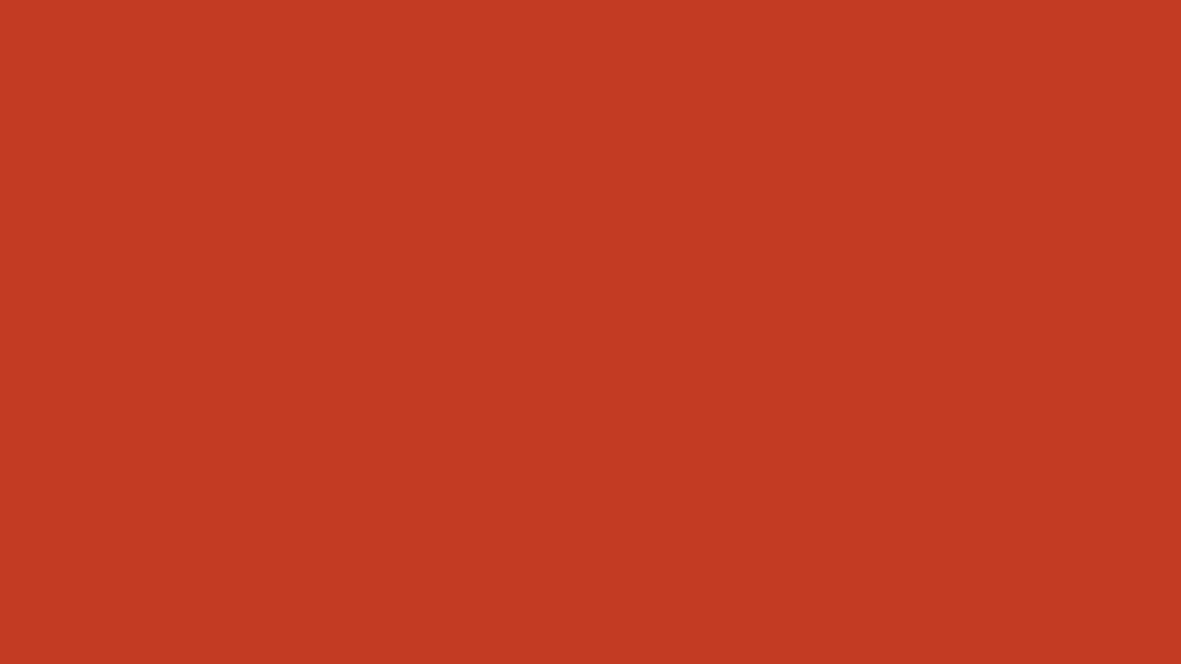 Dark Pastel Red solid color background preview (#C23B22)