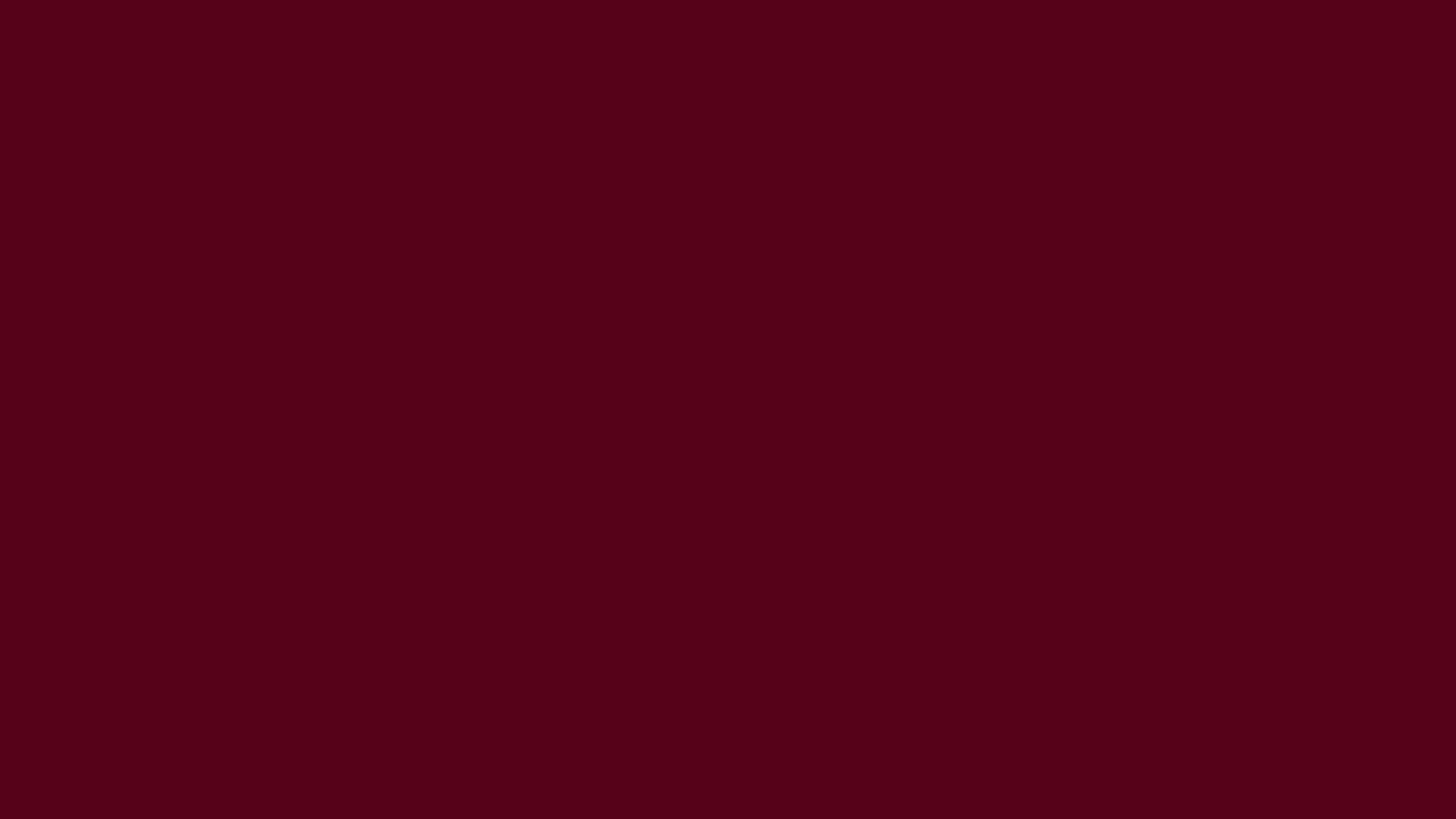 Dark Scarlet solid color background preview (#560319)
