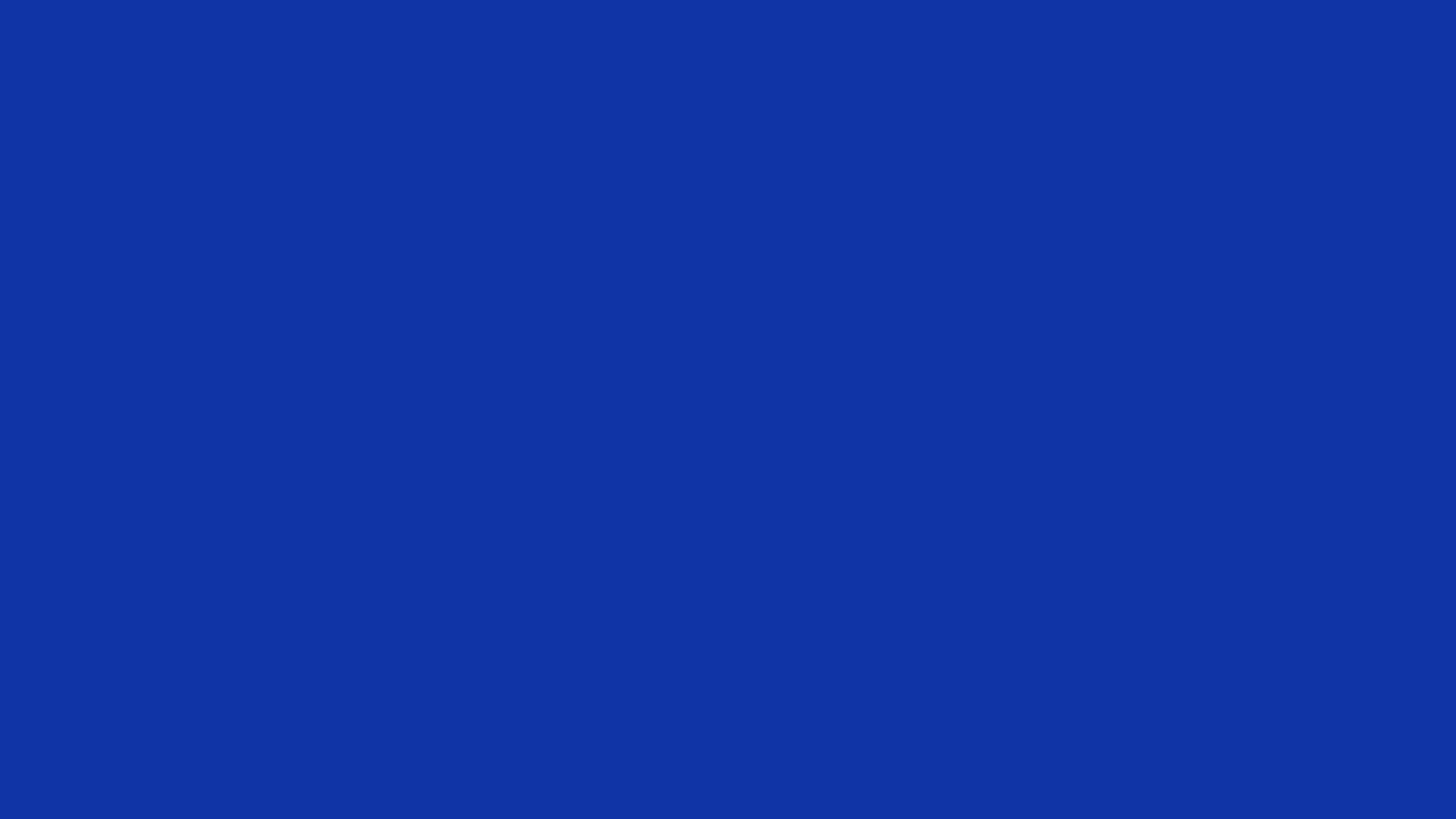 Egyptian Blue solid color background preview (#1034A6)