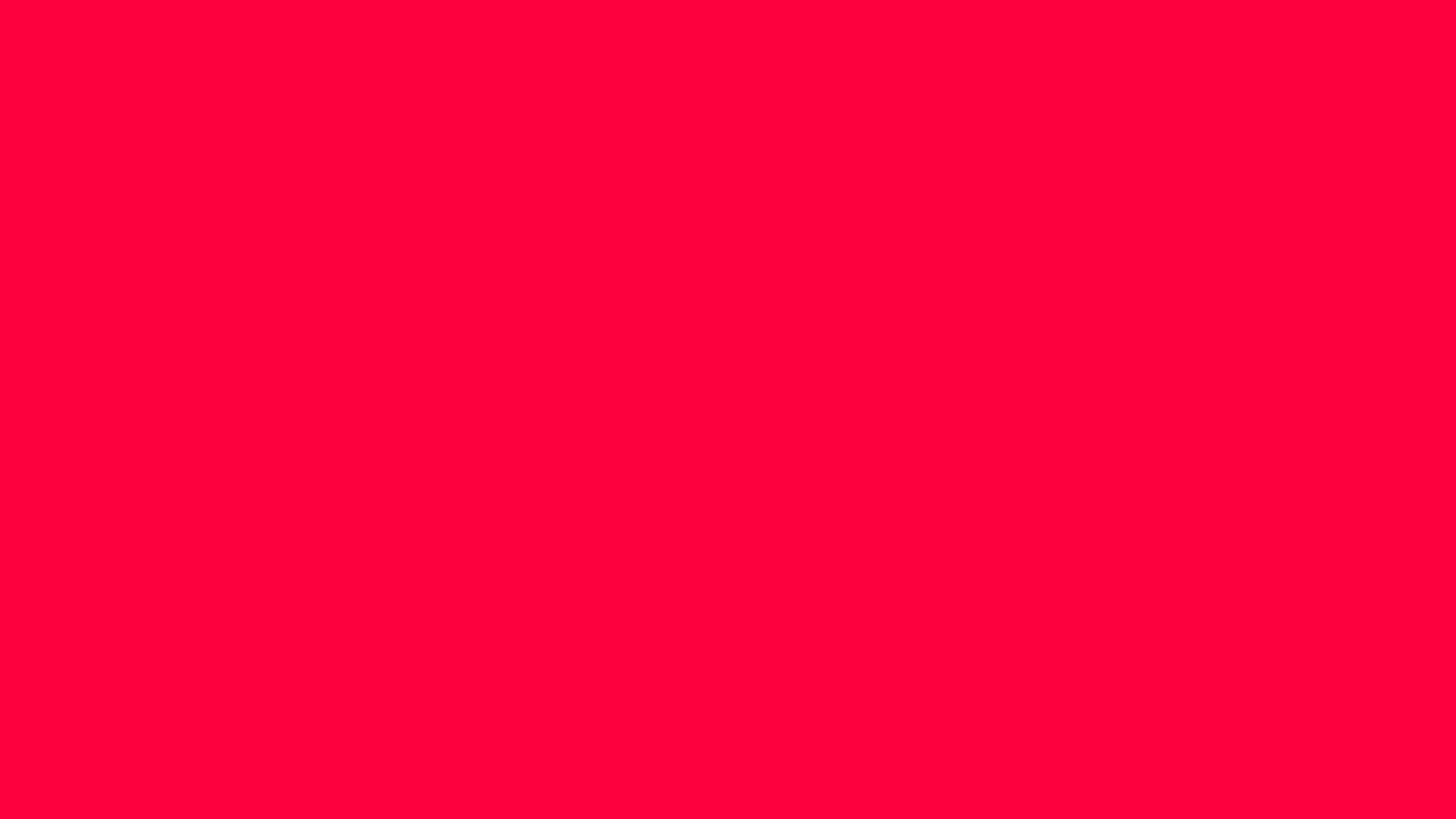 Electric Crimson solid color background preview (#FF003F)