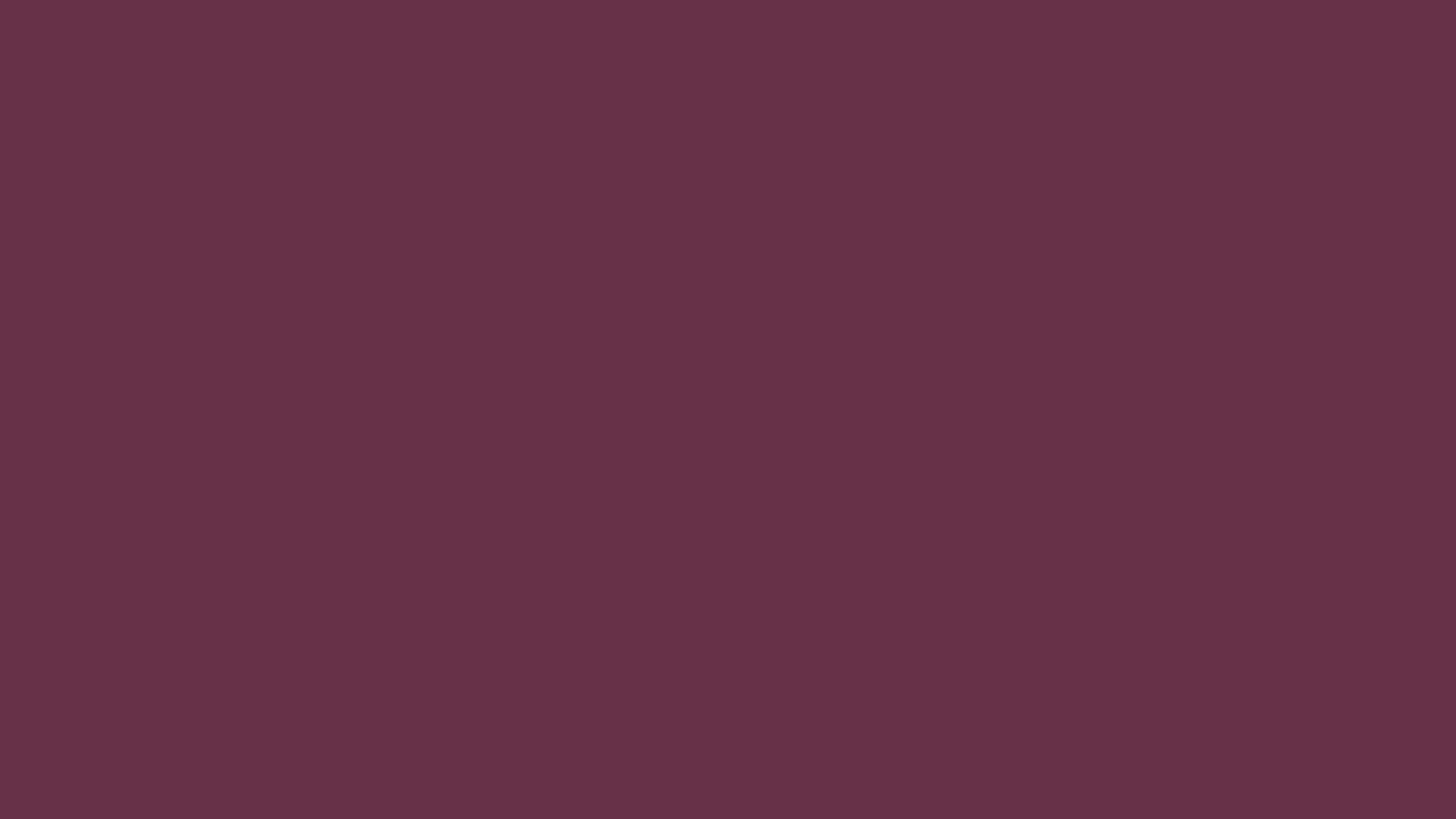 Old Mauve solid color background preview (#673147)
