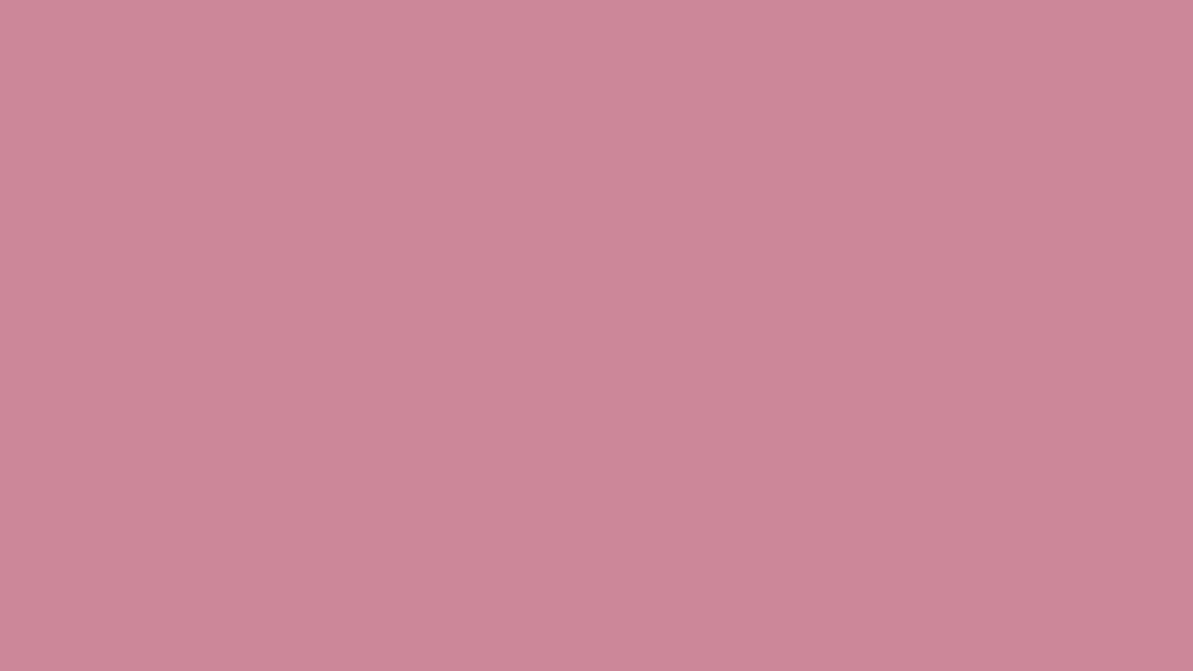 Puce solid color background preview (#CC8899)