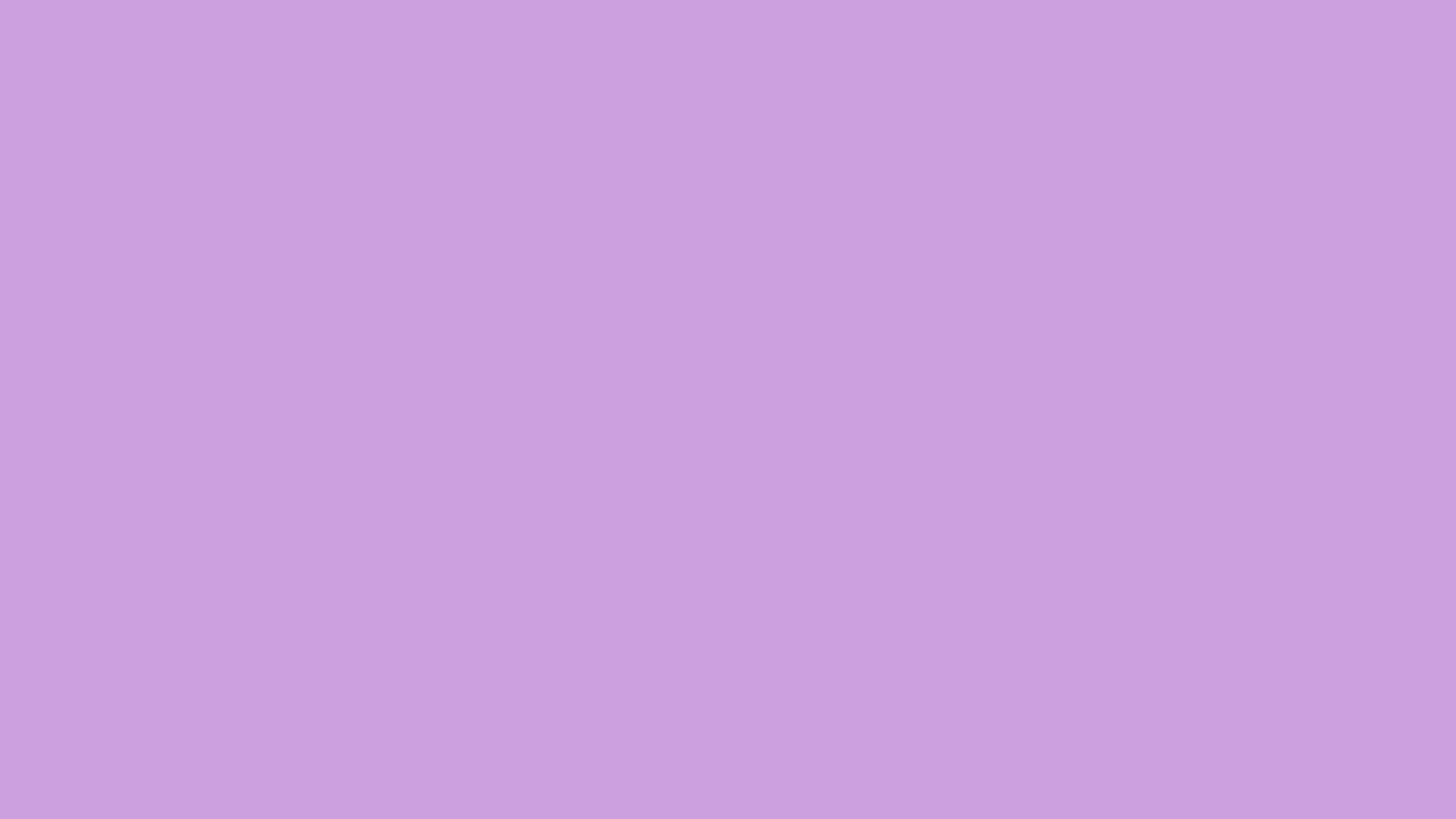 Wisteria solid color background preview (#C9A0DC)